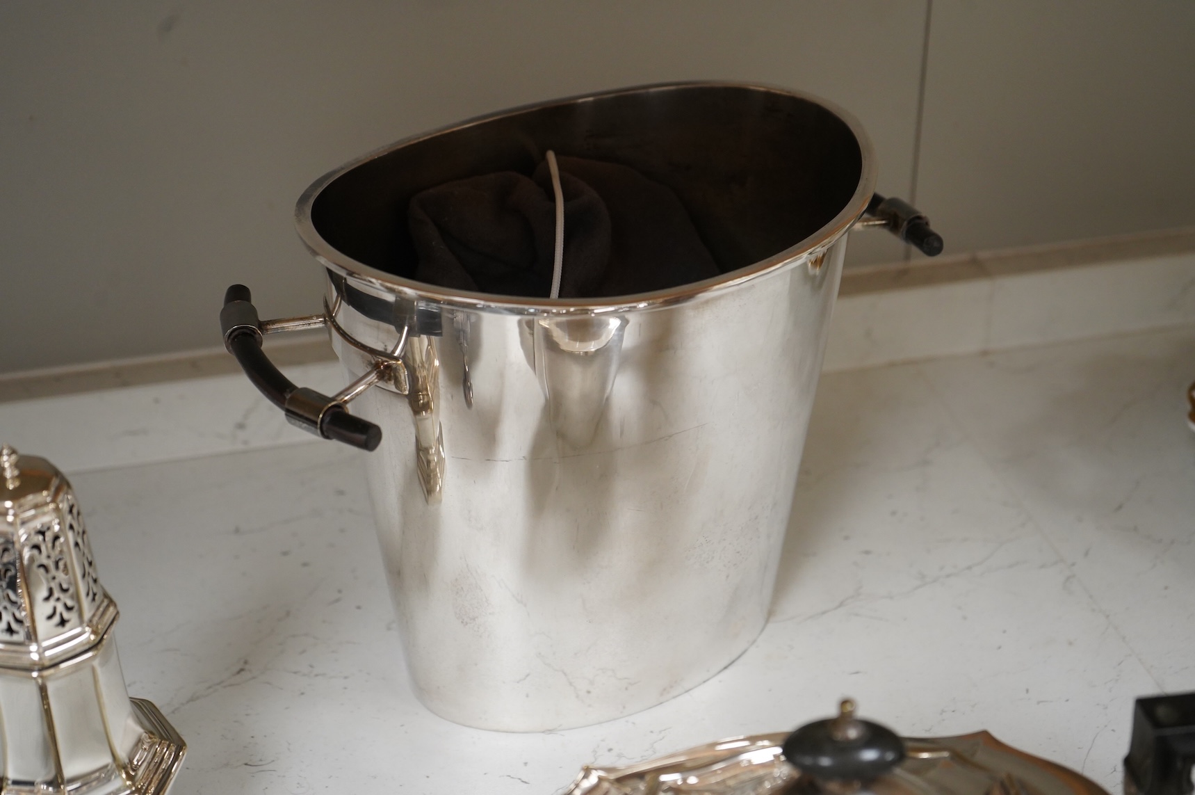 A collection of plated wares to include a vintage cocktail shaker with recipes, wine cooler and two plated entrée dishes including Art deco, largest 29cm wide